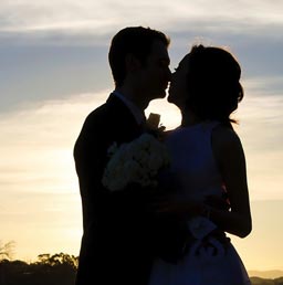 A silhouette of a mature dating couple.