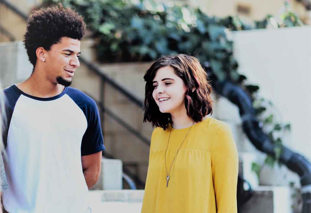 A vibrant photo of man and woman socializing