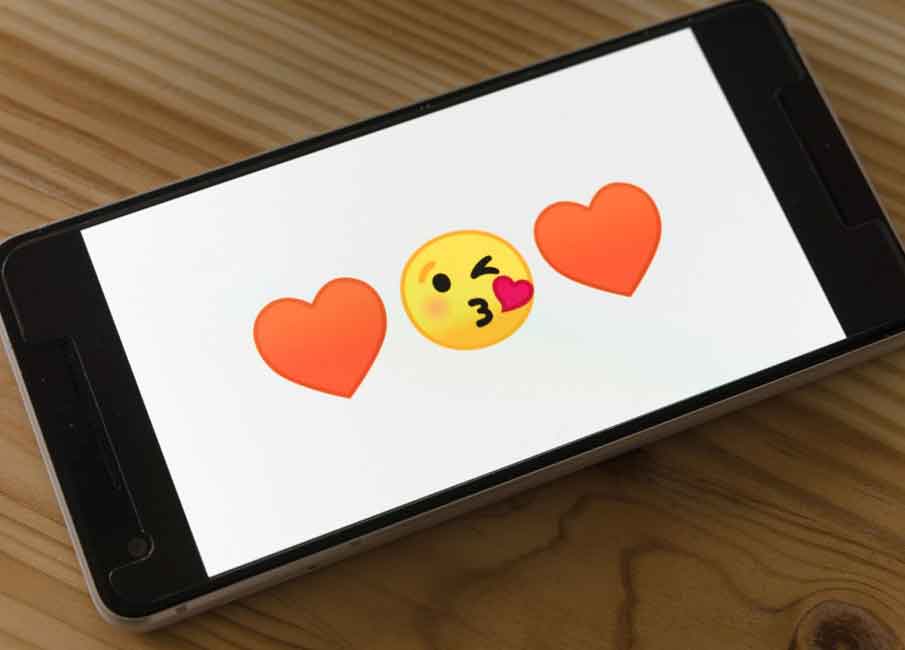Love emojis edited onto a phone screen